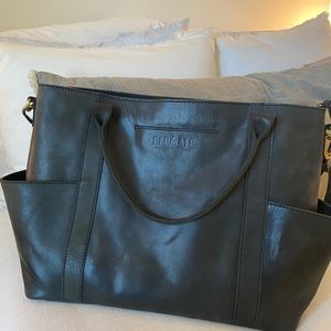 Elevate leather bag. Originally $328. Lots of pockets. Great for an everyday bag